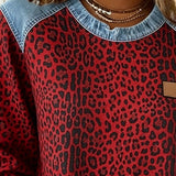 Zéphirine | Mikina s potlačou leopardieho vzoru v denimovom patchworku