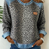 Zéphirine | Mikina s potlačou leopardieho vzoru v denimovom patchworku